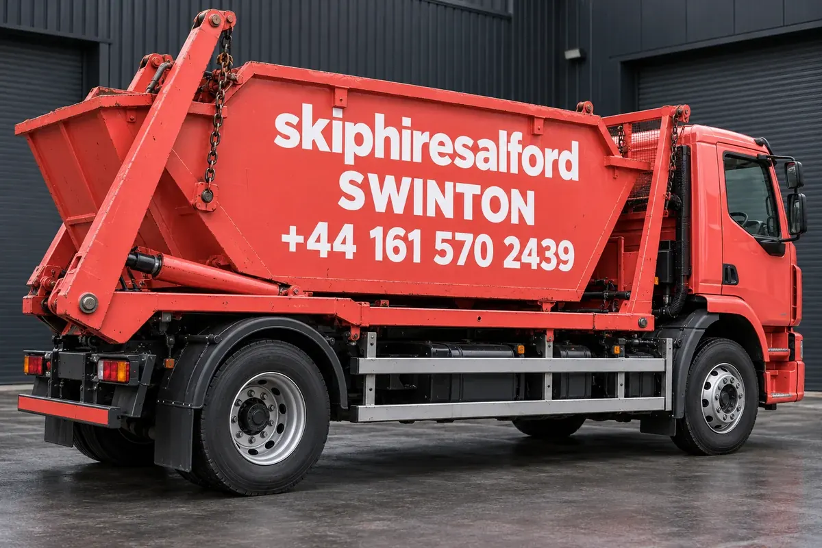 Coral truck with skiphiresalford, Swinton and +44 161 570 2439 on its container