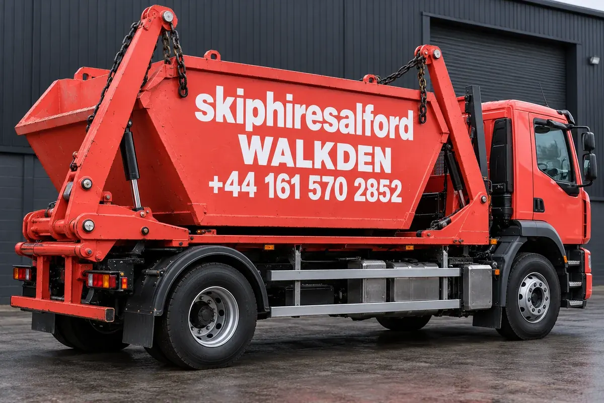 Coral truck with skiphiresalford, Walkden and +44 161 570 2852 on its container